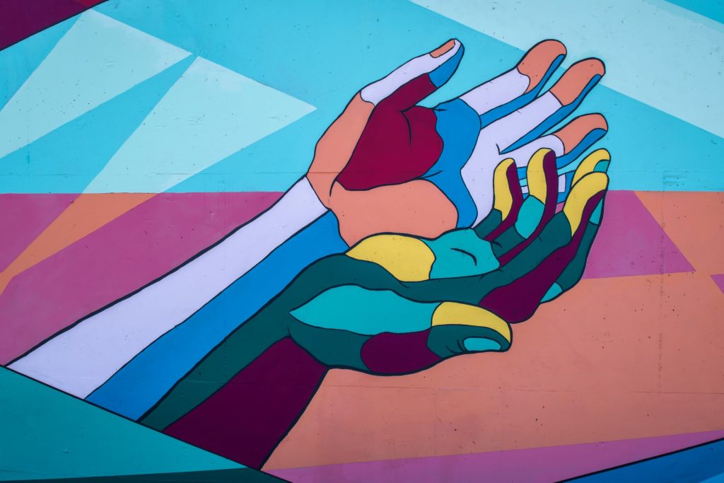 an artistic depiction of two hands.