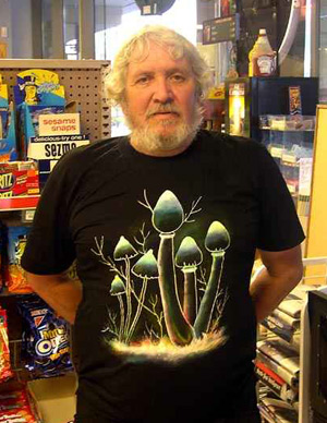 John W. Allen wearing a mushroom t-shirt