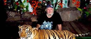 John W. Allen with tiger